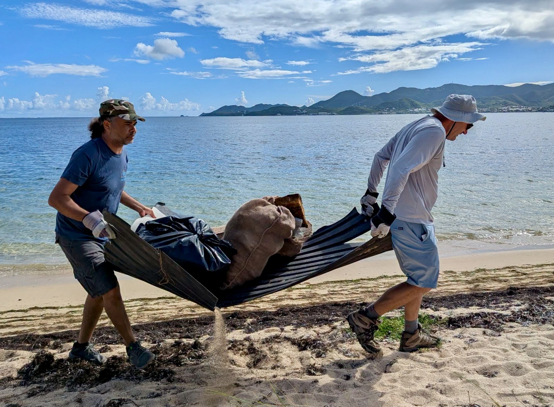 2Volunteers clearing debris at Anse des Sables La Belle Creole Sunday September 20